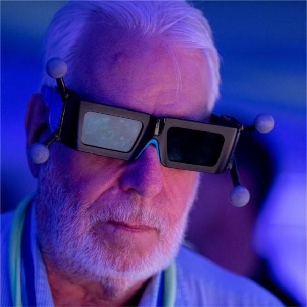 Clarke Borgeson tries on stereoscopic 3D glasses to view a rendering at The Blue Dot Experience during Tech Week September 19